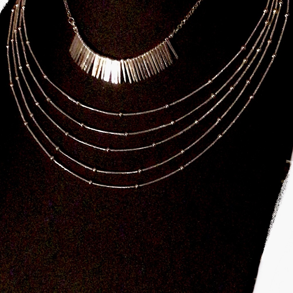 Bundle, 2 silver tone necklaces by New York. 1 spike sunburst and 1 multi strand